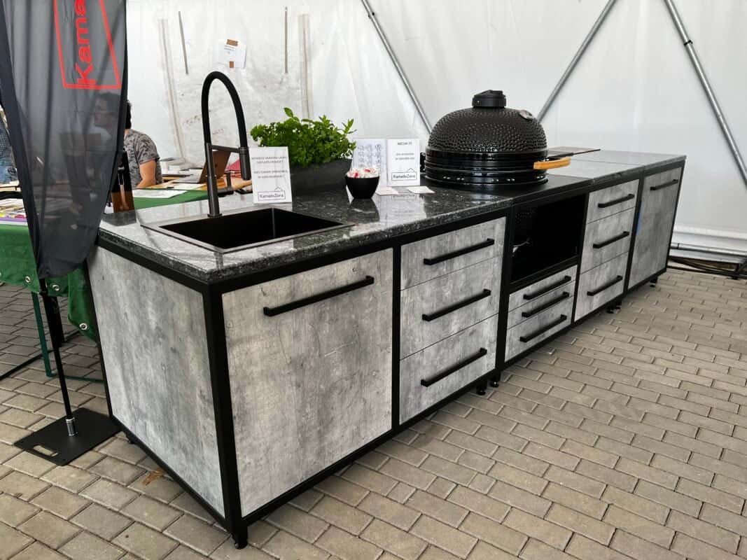 Modular outdoor kitchen with a built-in Kamado grill